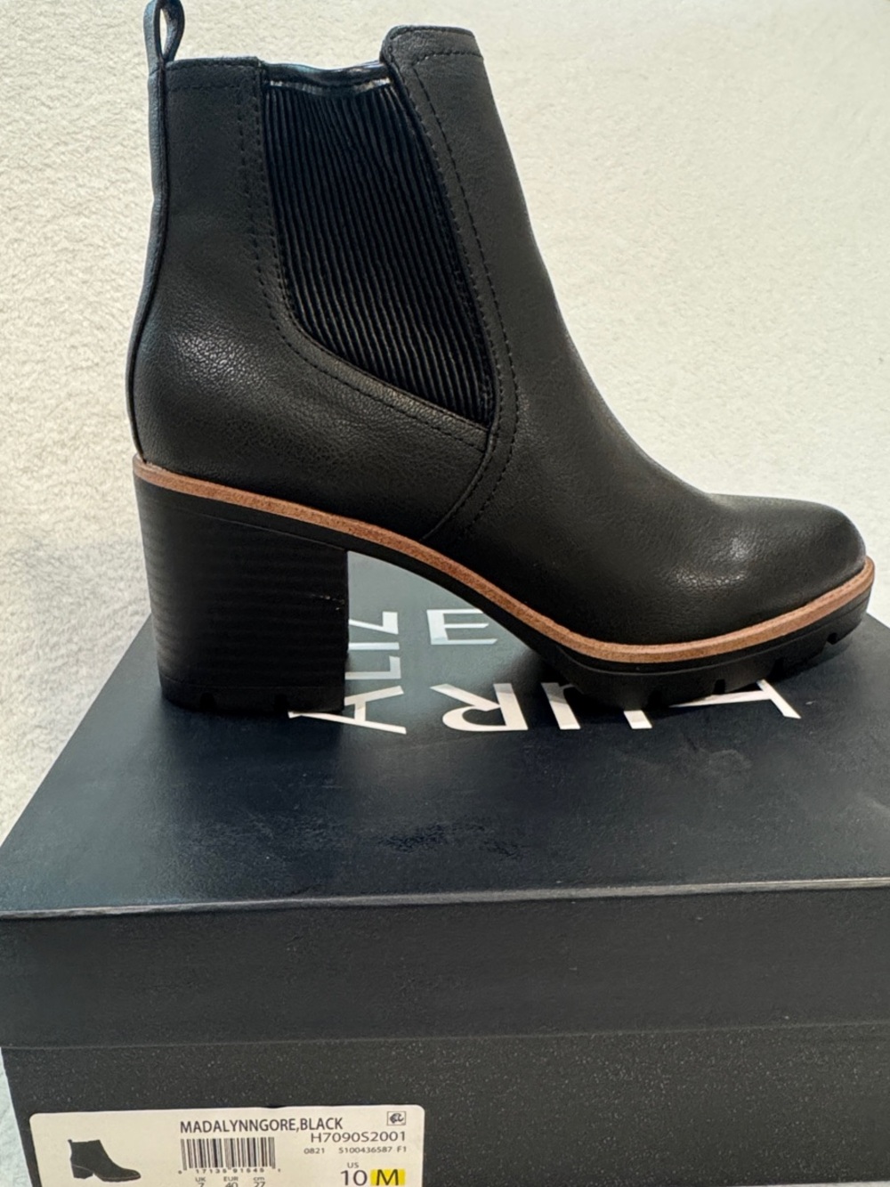 Mandalynn Black Leather Chelsea Ankle Boot with Lug Sole